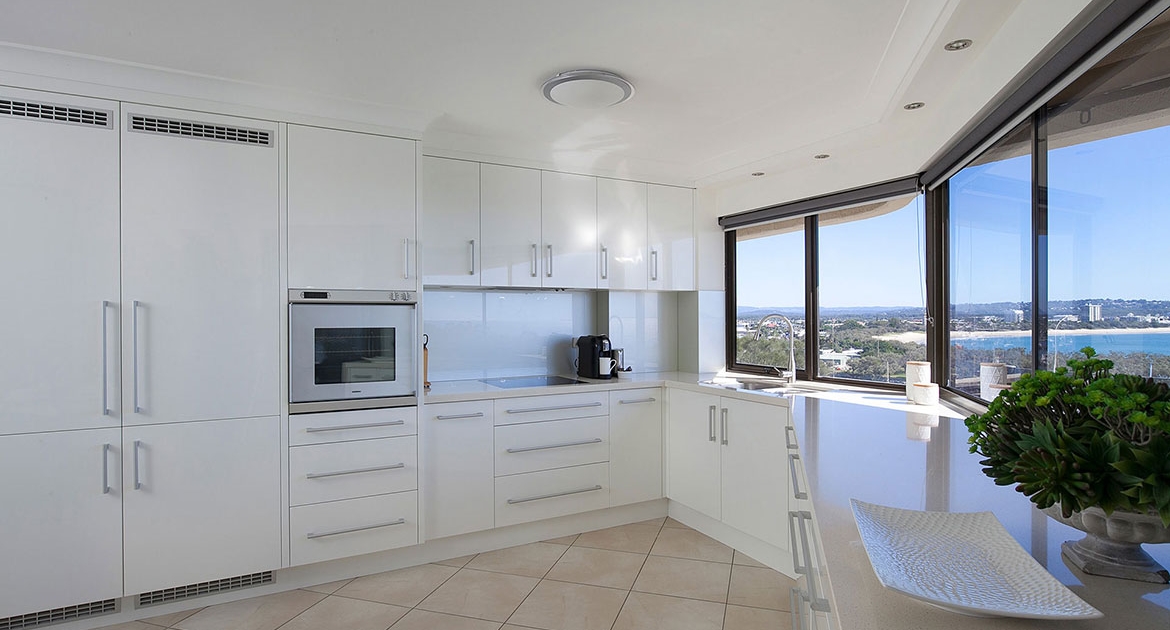 Spacious kitchen with ocean views at Cartwright Beachfront Apartment | Sunshine Coast Holiday Rentals