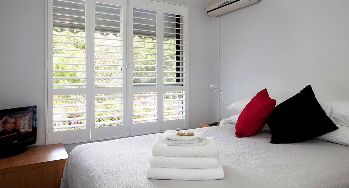 Bedroom with green view at Villa Seascapes | Sunshine Coast Holiday Homes