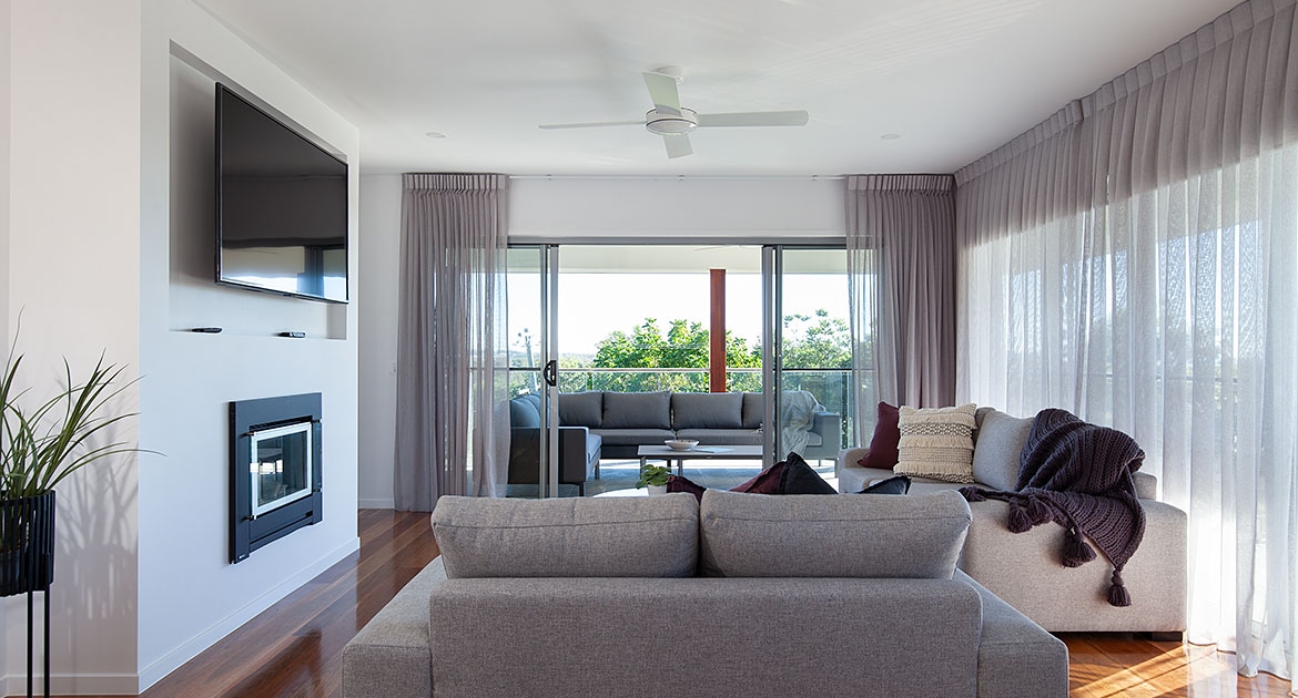 Living room expanding to outdoor area at Sea Renity Coolum Beach | Sunshine Coast Holiday Homes