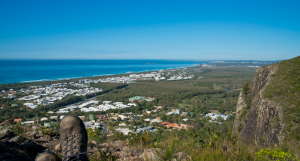 View from Mount Coolum of the beach and blue cloudless sky