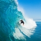 Guy Surfing | Featured image for Best Places to Surf Sunshine Coast | Blog